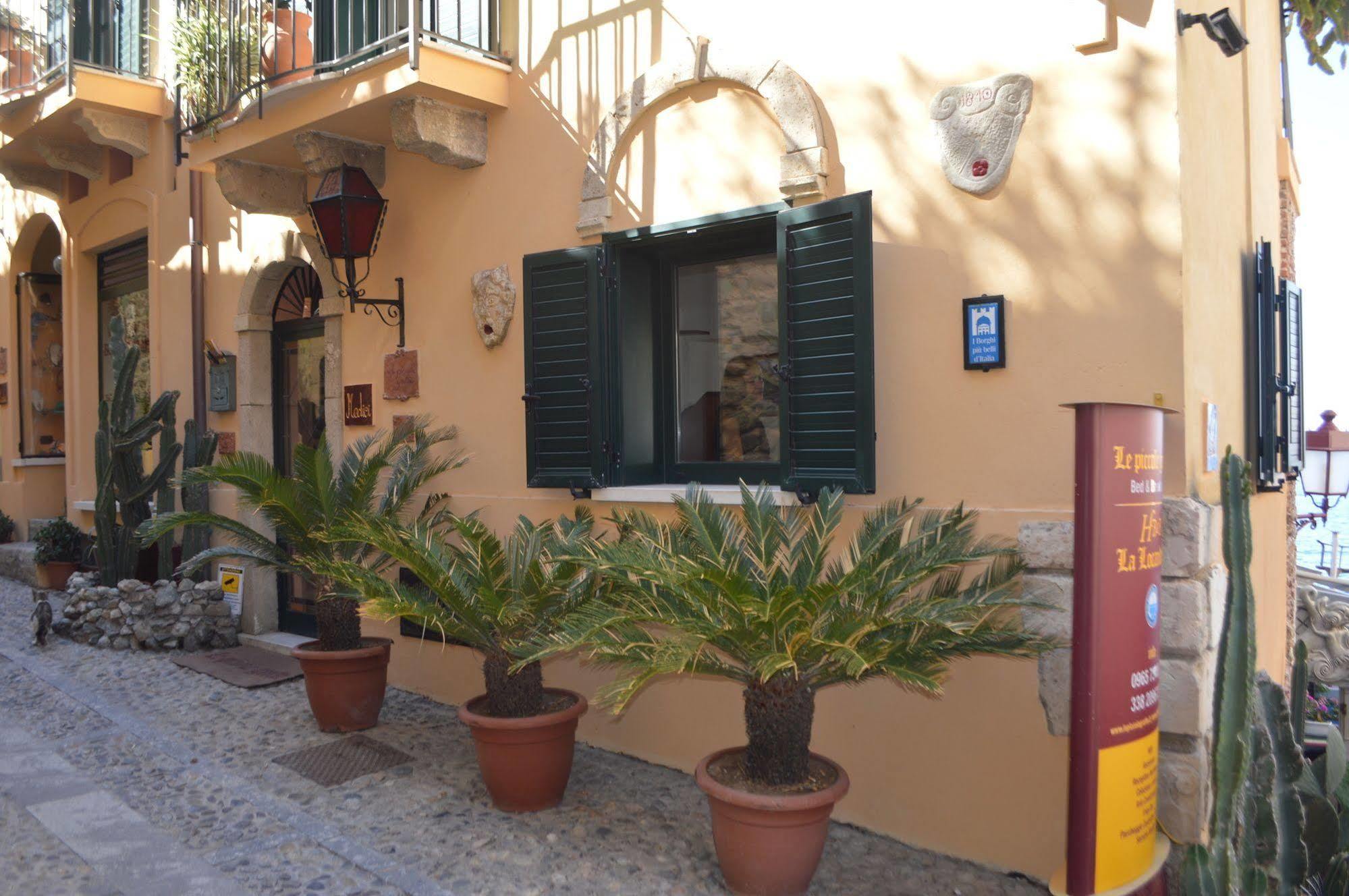 Le Piccole Grotte Bed & Breakfast Шила Екстериор снимка